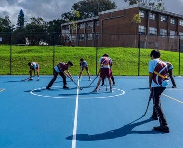 Students playing hockey